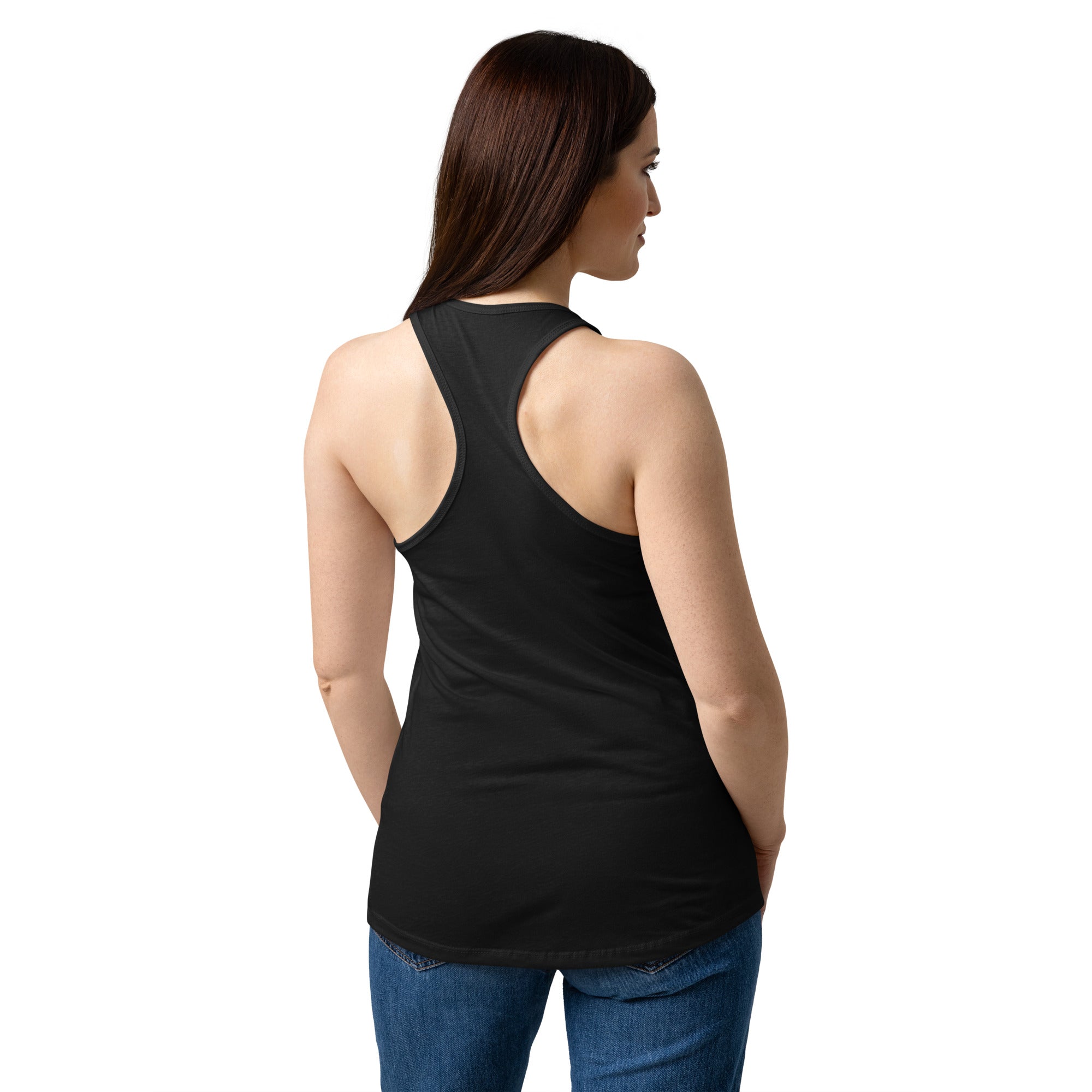 Woman wearing a black tank top and blue jeans on a white background
