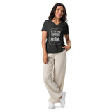 woman wearing a heather grey vneck tshirt with better living through potions design on it