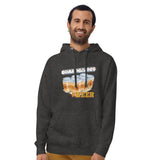 A man wearing a dark heather gray hoodie with a graphic print of beer cans and the text 'BOARD GAMES' and 'BEER'.