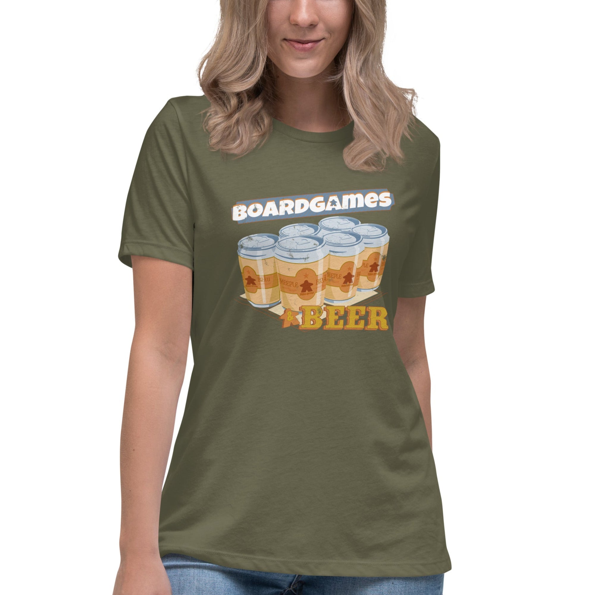 A woman wearing an olive green graphic t-shirt with a 'Boardgames & Beer' design, paired with blue jeans, against a plain white background.