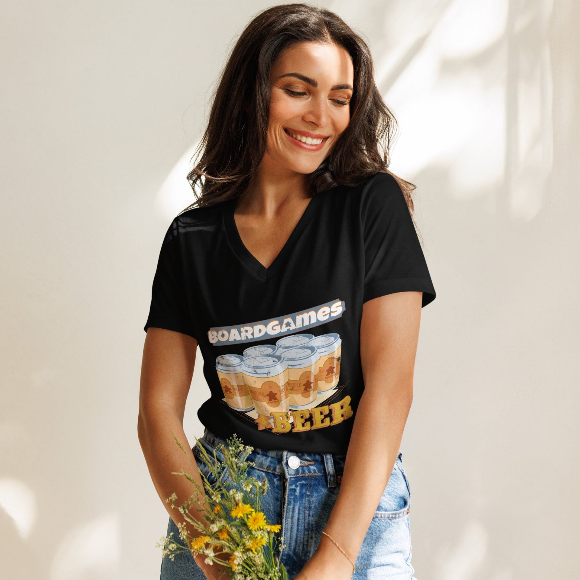 Women's cotton-blend v-neck t-shirt printed with "Boardgames & Beer" text above an illustration of a six-pack of beer cans.