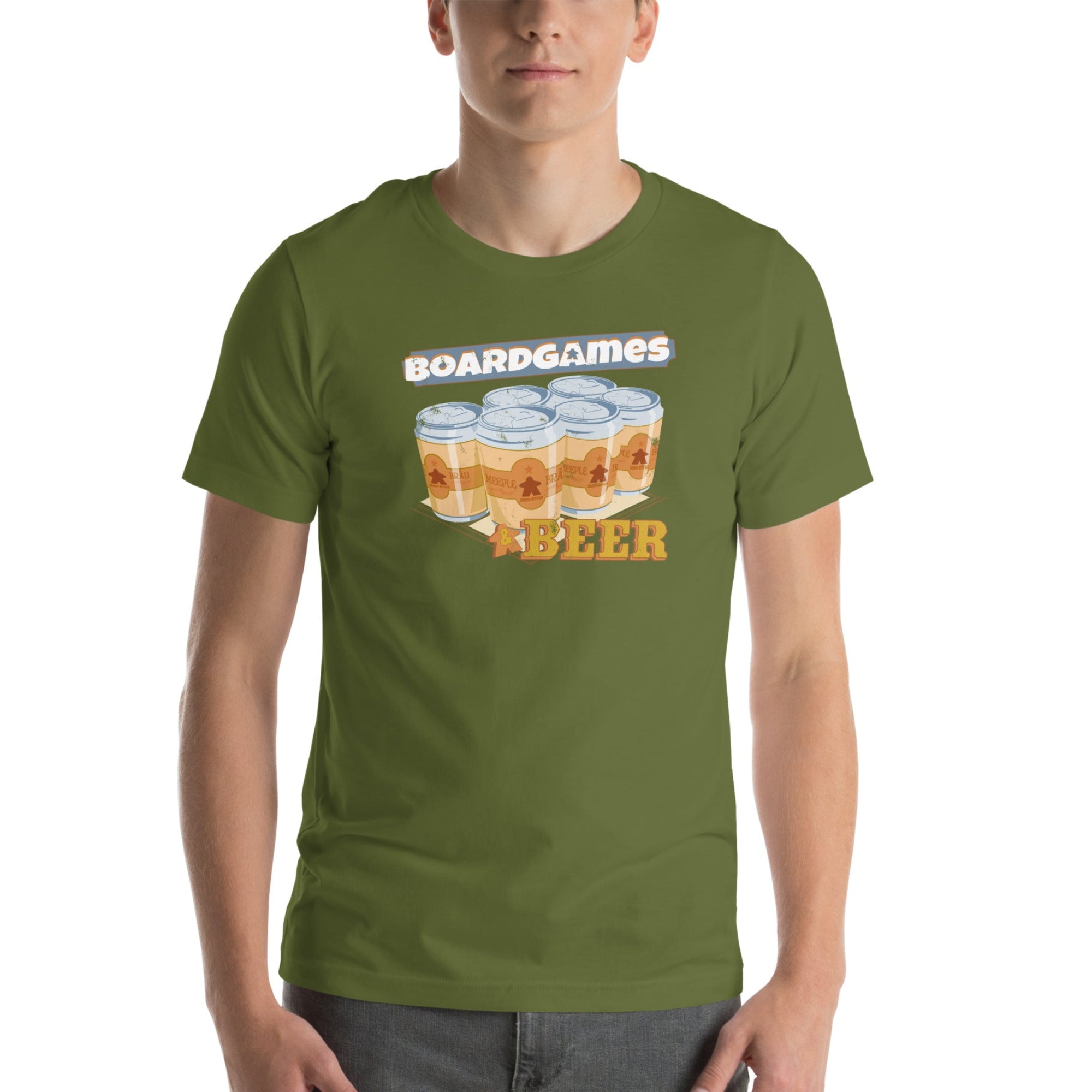 A man wearing an olive green crewneck t-shirt with a graphic print that reads 'BOARDGAMES' above an illustration of six beer cans and 'BEER' below, paired with gray jeans against a plain white background.