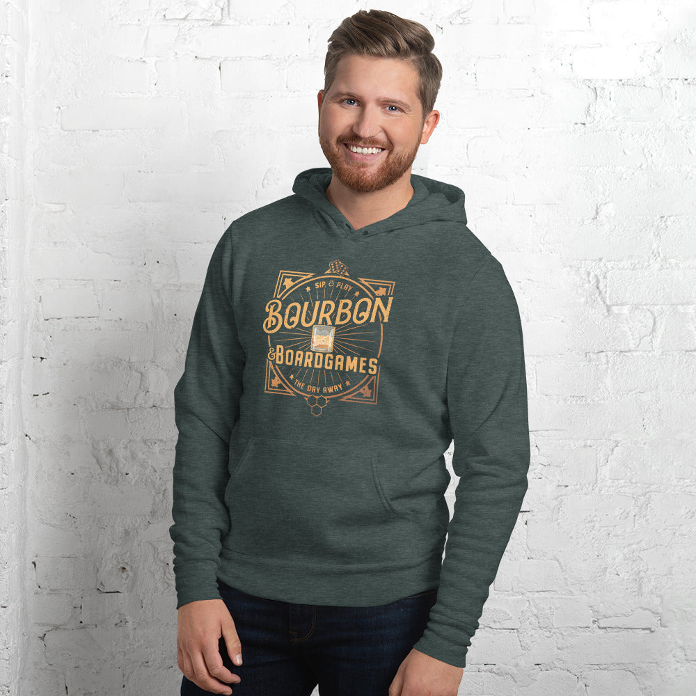 Smiling male model wearing our heather green bourbon and board games hoodie