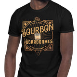 A man wearing a black short-sleeve t-shirt with a vintage-style graphic that reads 'Bourbon Boardgames' in gold lettering, paired with blue jeans, set against a plain white background.