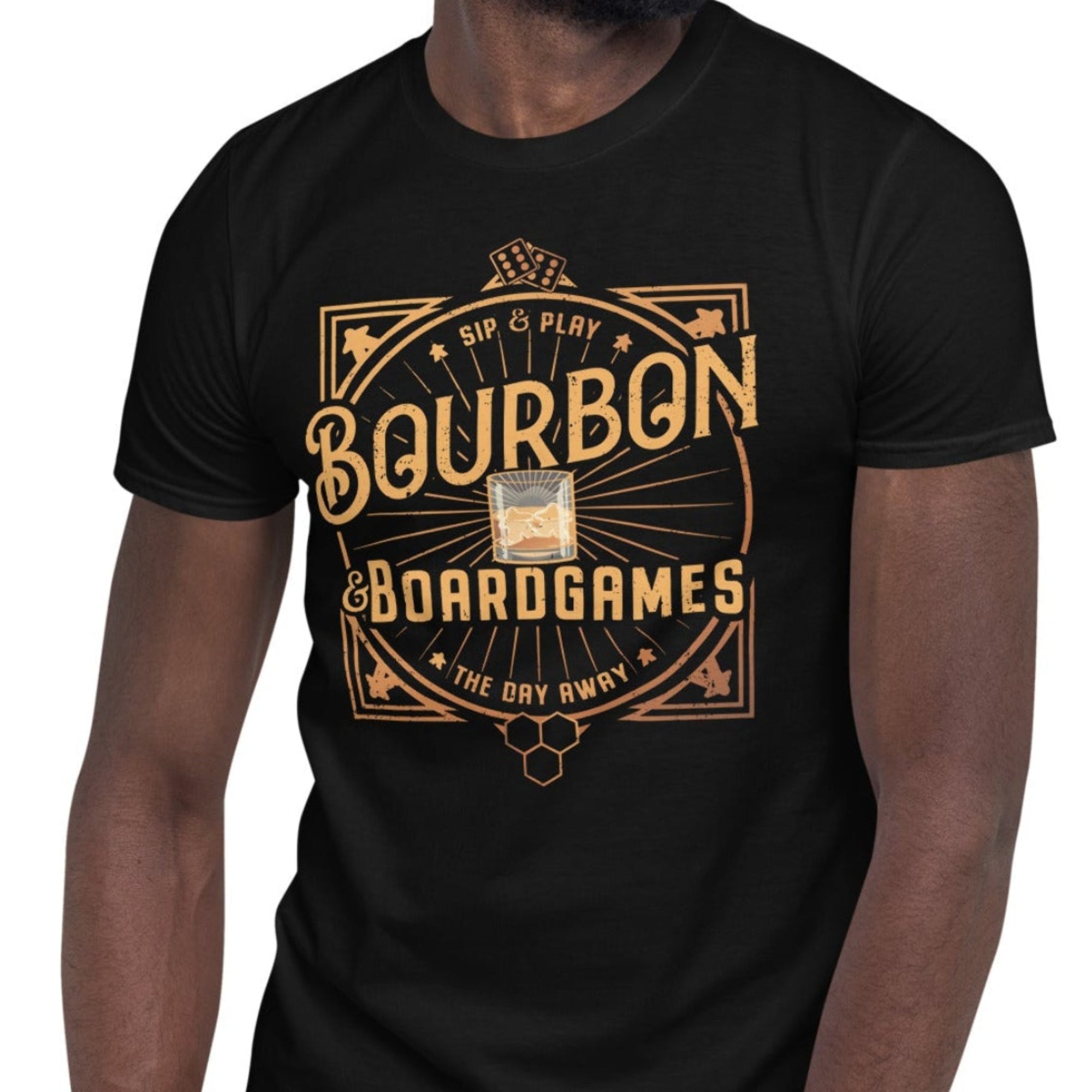 A man wearing a black short-sleeve t-shirt with a vintage-style graphic that reads 'Bourbon Boardgames' in gold lettering, paired with blue jeans, set against a plain white background.