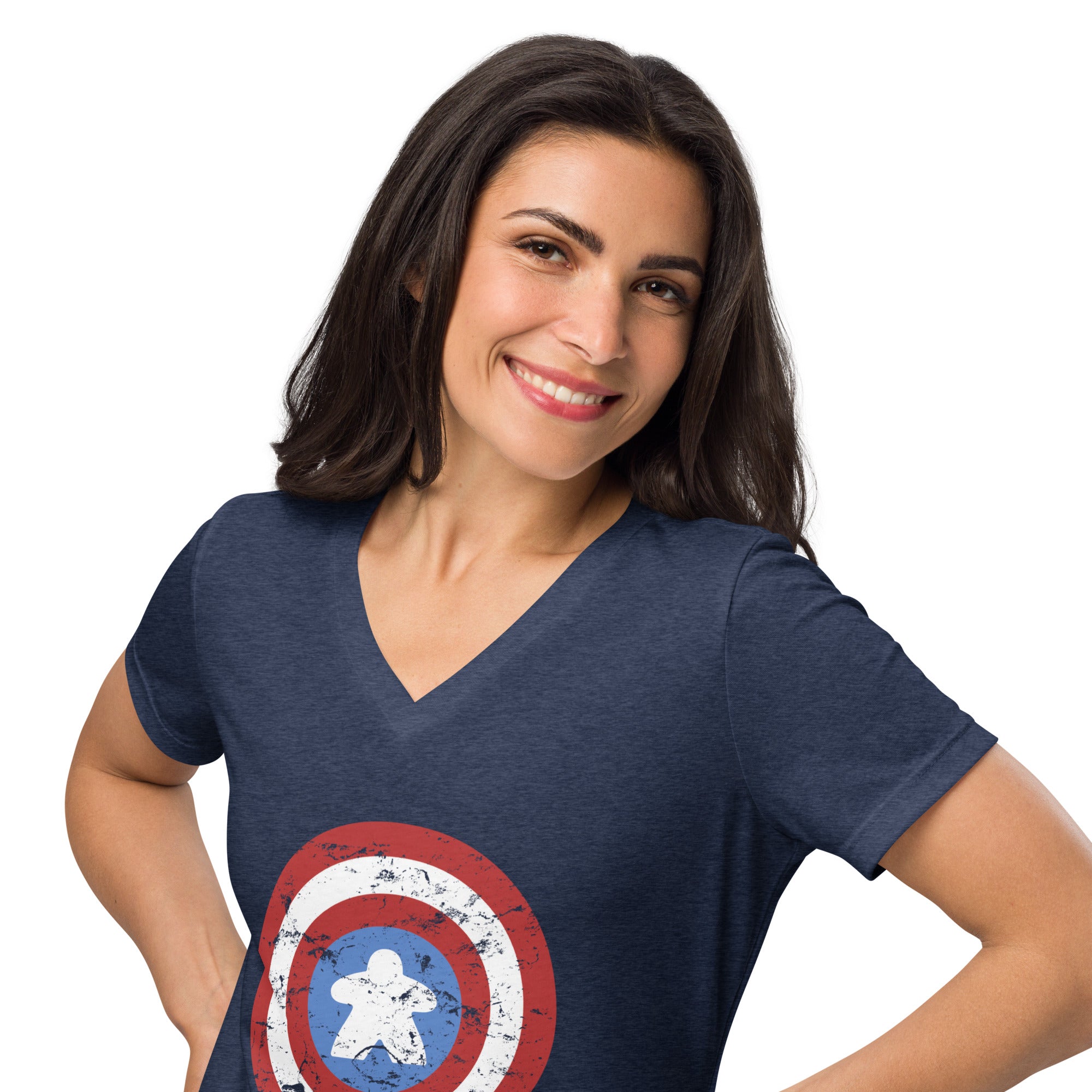 A woman with dark hair smiling and posing in a heather navy blue v-neck t-shirt featuring a distressed Captain Meeple shield graphic on the front, set against a plain white background.