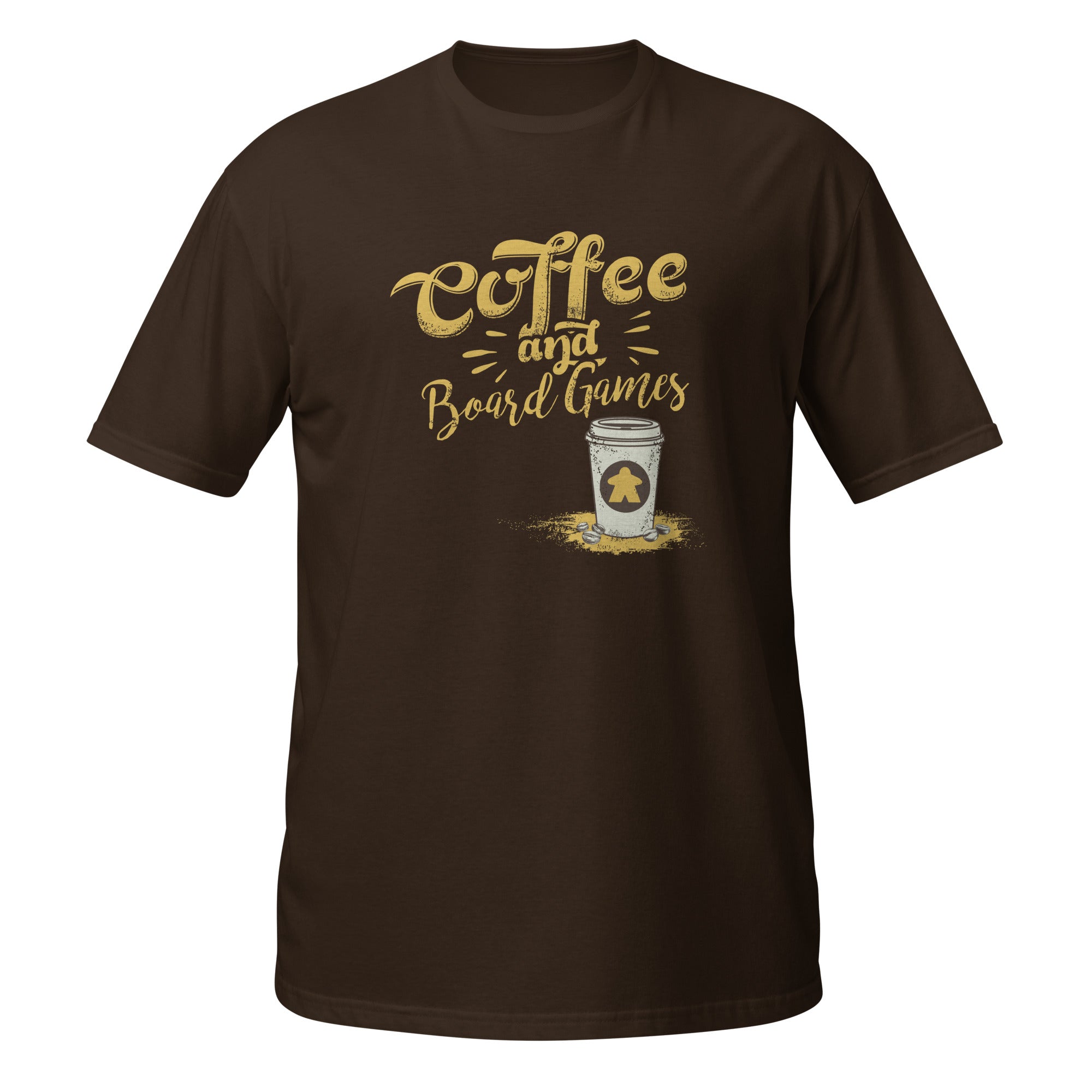 A dark brown short-sleeve t-shirt with a graphic on the chest that reads 'Coffee and Board Games' in a gold textured font, above an illustration of a coffee cup with a meeple on it.