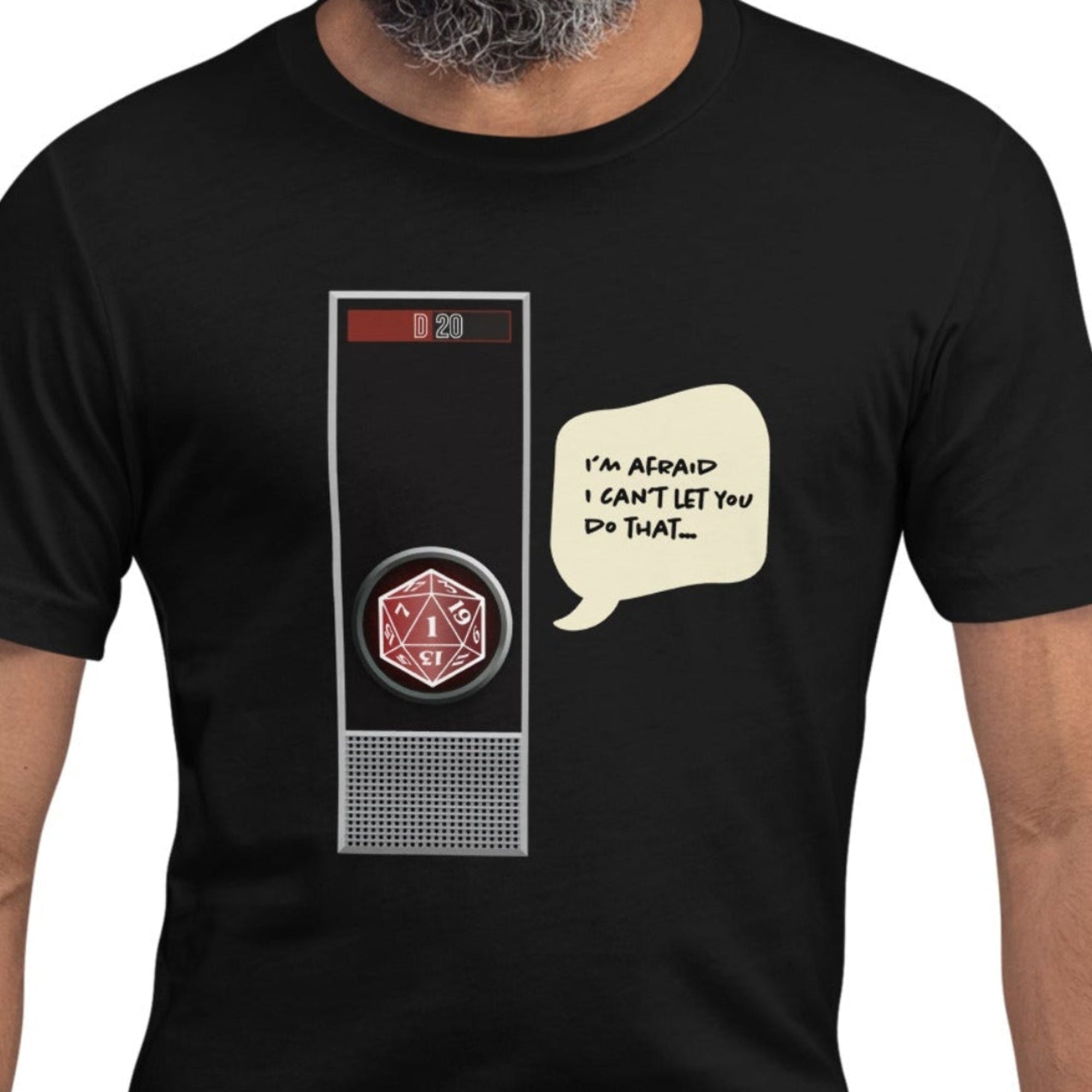 A man wearing a black short-sleeve t-shirt with a graphic of a security guard door and a speech bubble that reads 'I'm Afraid I Can't Let You Do That'